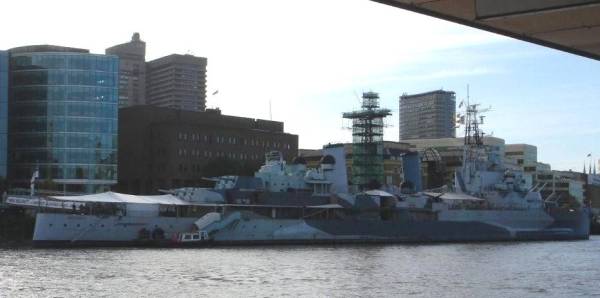 HMS Belfast, a 'heavy' British cruiser of  World War II is shown tied up to a dock on the Thames River in London, late October 2008, photo by Ray Brown