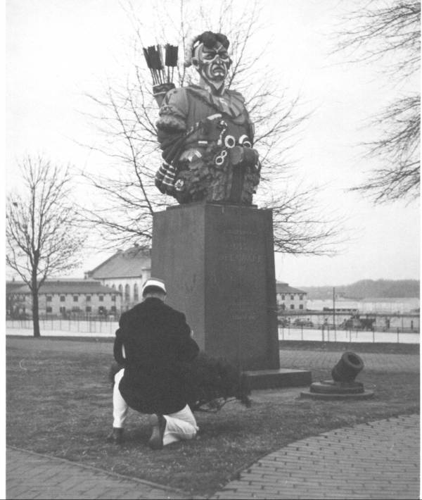 Tecumseh, a replica of the Indian chief, a popular landmark on the U.S. Naval Academy ground. Decorated by midshipmen in the fall to get ready for football games. About 1938